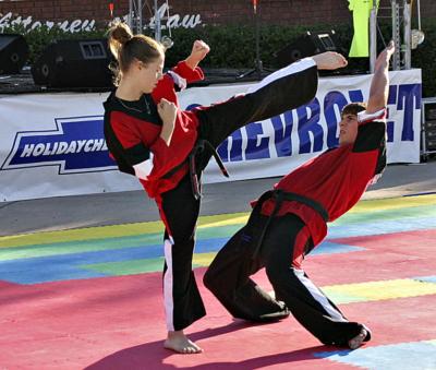 Girl doing a karate kick